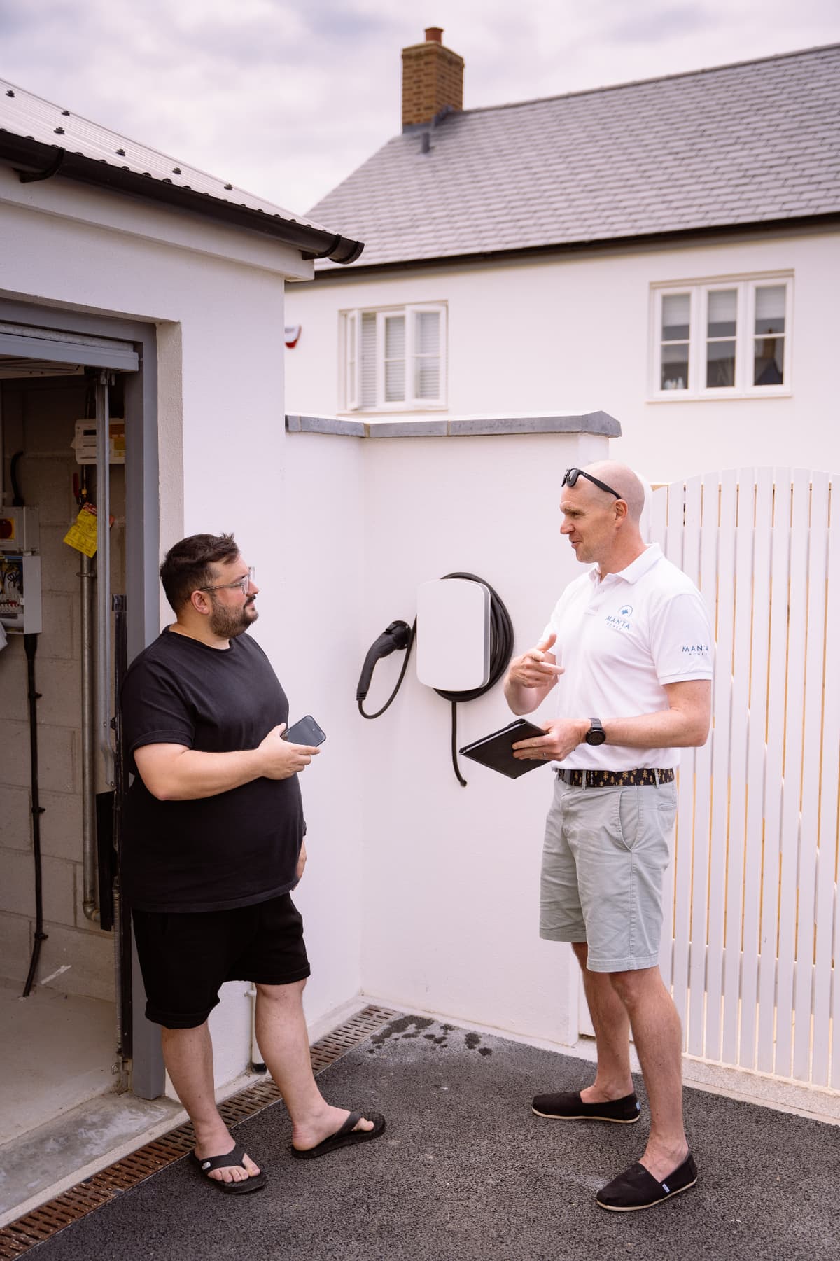 Manta Power team installing EV charger